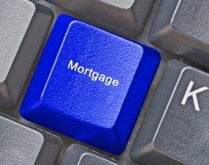 Kelowna mortgage broker - John Antle - keyboard with mortgage button